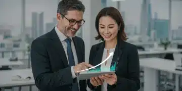 Couple reviewing 401(k) growth strategies on a tablet in a modern office, symbolizing smart financial planning for retirement.