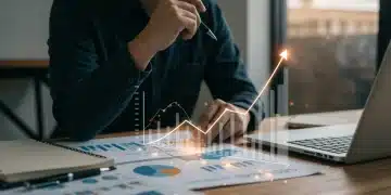 Person analyzing digital credit score graph on a tablet with financial documents.